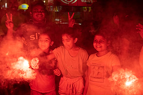 Cricket fans celebrate in Lucknow